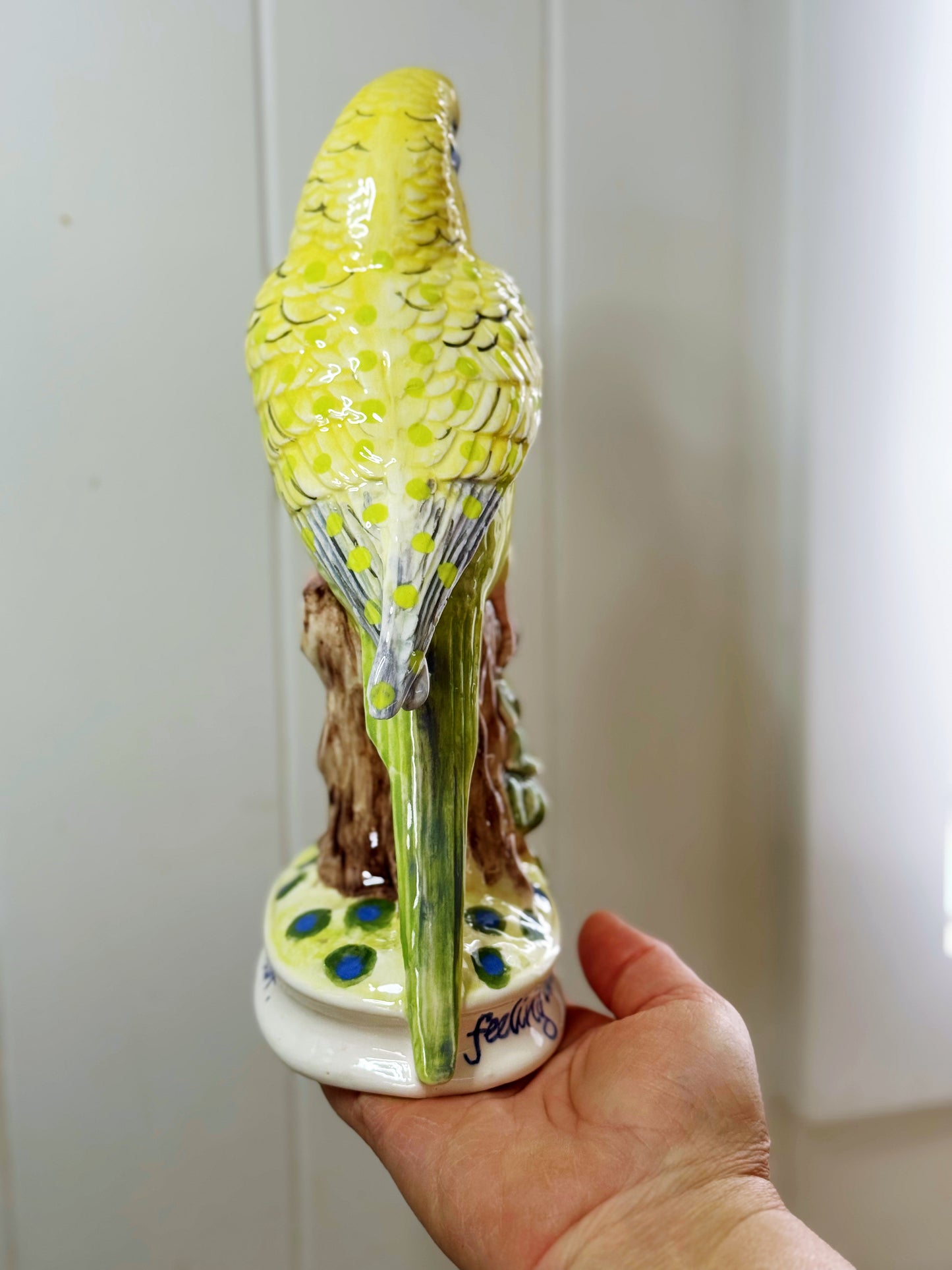 Cute budgie statue