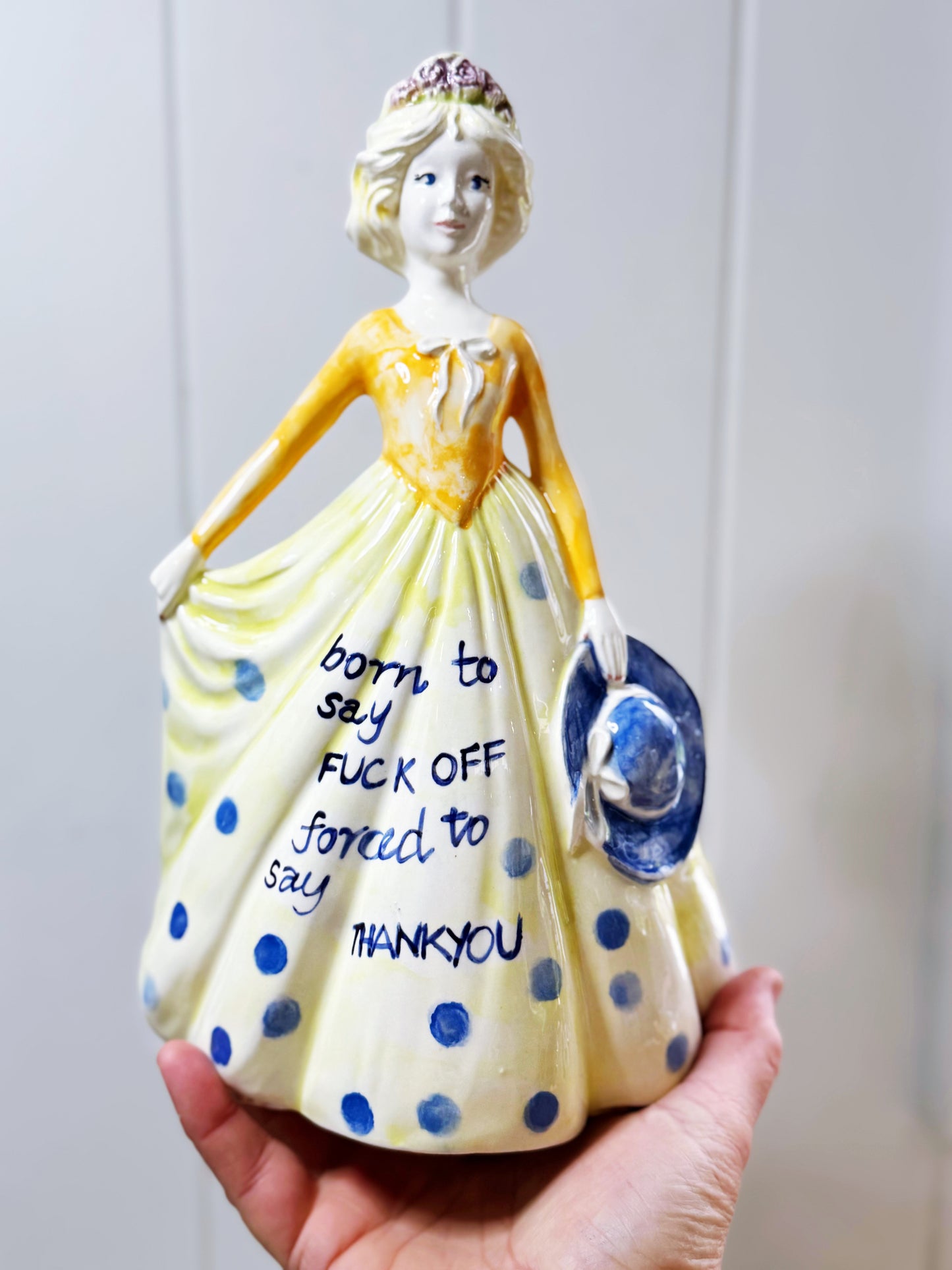 Forced to say thankyou statue