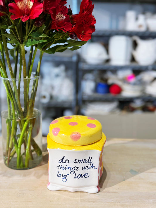 ‘Do small things with big love’ lidded canister