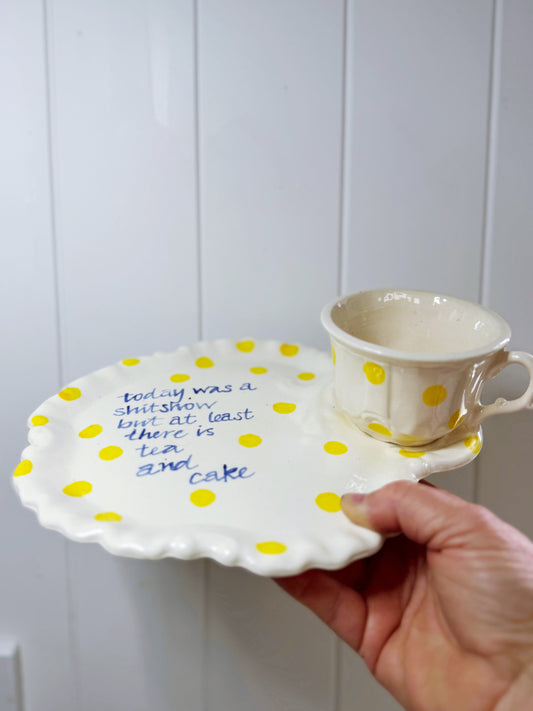 ‘At least there is Tea + cake’ teacup and cake plate tennis set.