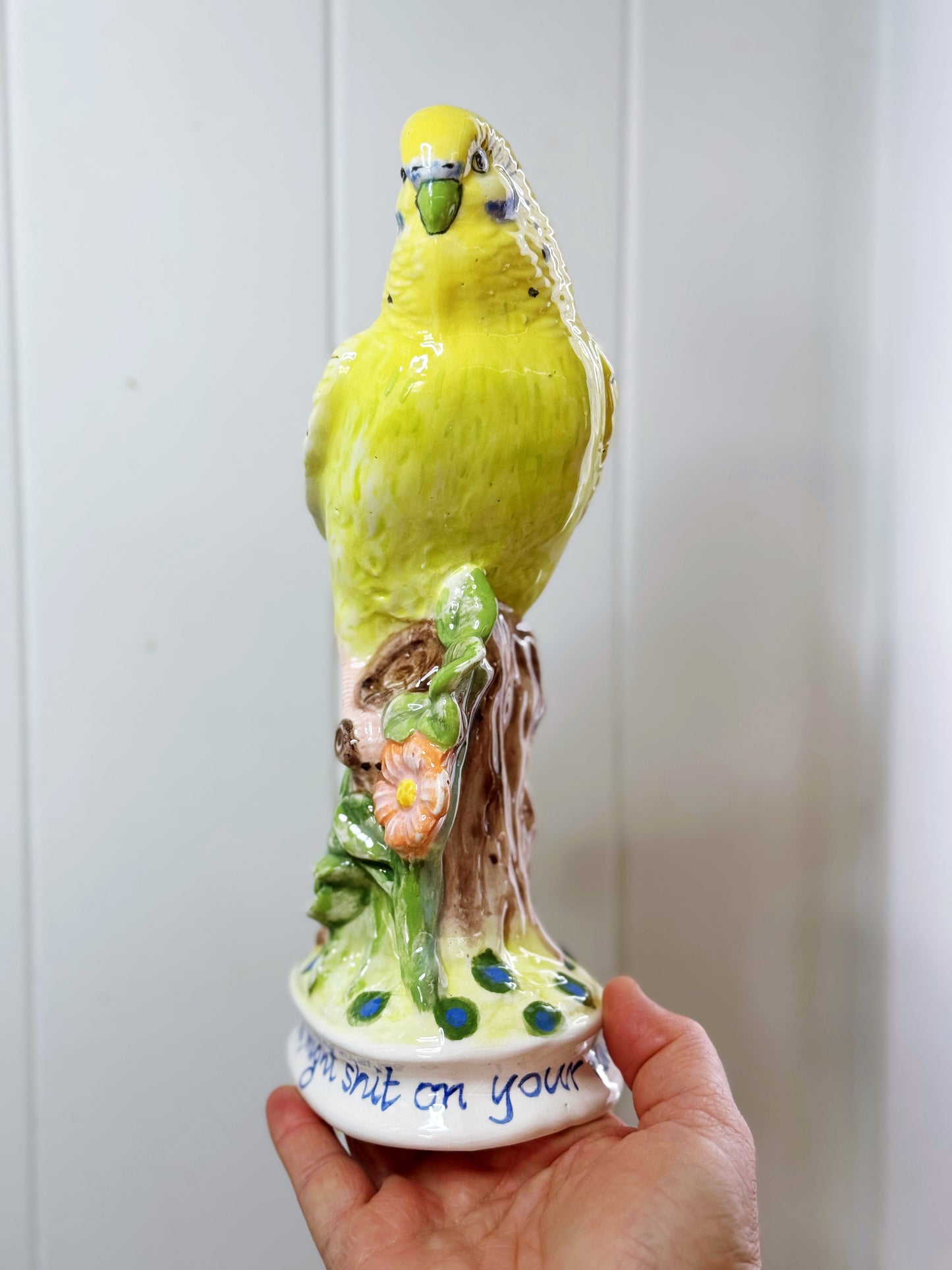 Cute budgie statue