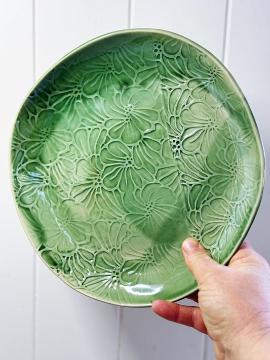 Hibiscus platter with green oribe glaze